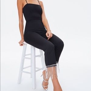 Black jumper with rhinestone fringe trimming